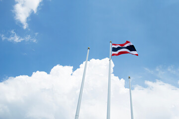 Thailand flag isolated on the blue sky with clipping path. close up waving flag of Thailand. flag symbols of Thailand.