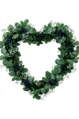 a heart shaped wreath made of green leaves