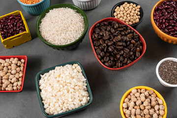 several pots with raw grains for preparing healthy food