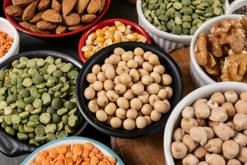 several pots with raw grains for preparing healthy food