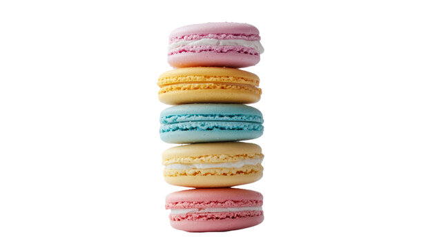 A close-up image of five colorful macarons stacked on top of each other with white cream filling.