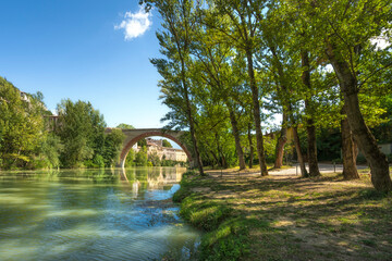 Ponte della Concordia, Roman bridge and the bank of river Metauro. Fossombrone, Marche, Italy.