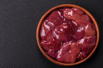 Fresh raw chicken or beef liver with salt, spices and herbs