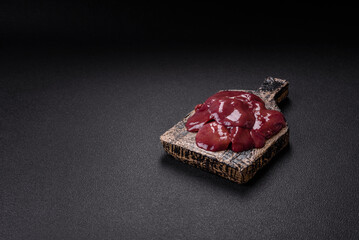 Fresh raw chicken or beef liver with salt, spices and herbs