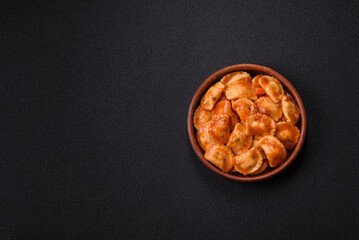 Ravioli with meat or vegetarian with ricotta, salt and spices