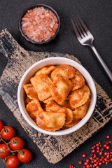 Ravioli with meat or vegetarian with ricotta, salt and spices