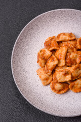 Ravioli with meat or vegetarian with ricotta, salt and spices