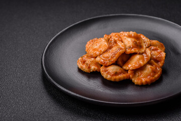 Ravioli with meat or vegetarian with ricotta, salt and spices