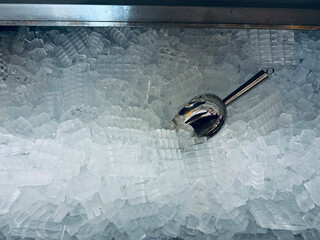 Ice cubes store in ice making machine for clean product. Ice cube maker. Cube ice machine. Suitable...