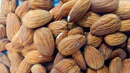 Almond in shell closeup white Background of almonds Healthy food