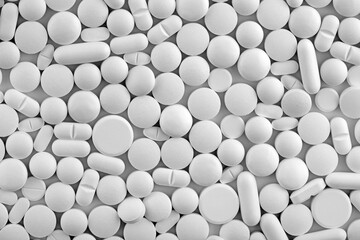 Group of many medicine white pills macro shot