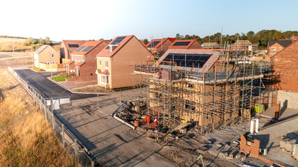 Aerial view of eco friendly and energy efficient homes under construction