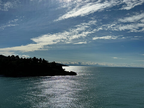  Blue shiny sea and beautiful cloudy sky.
