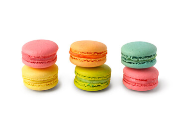 Different tasty sweet macaroons on white background