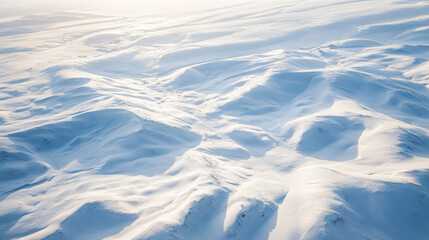 Natural beauty of snowy mountain landscape, pristine winter scenery, aerial view of snow-covered peaks, winter wonderland concept