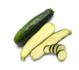Fresh green zucchini with slices on white background
