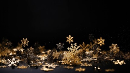 Christmas snow gold flakes confetti on black backdrop