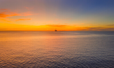 Obraz premium Southport, Merseyside, UK, September 16, 2024; Aerial view of the Oil Gas Platform off the coat of Southport with Stunning Sunset, Southport Merseyside