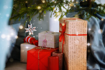 Close-up of Christmas presents in wrapping paper are on the floor under the Christmas tree