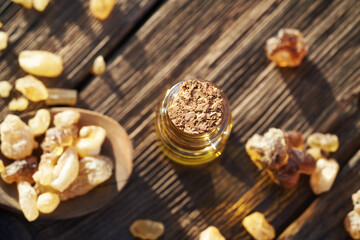 A bottle of frankincense essential oil with boswellia resin