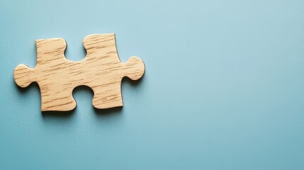 Blue background with two connected jigsaw puzzle pieces. Concept of teamwork, connection, and solving problems. Minimalist look.