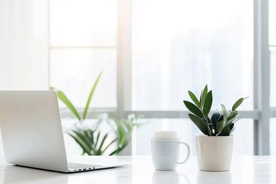 Minimalist home office setup with a laptop and green plants on a white desk, creating a clean and bright workspace that promotes productivity and creativity., Generative AI