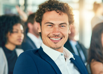 Fototapeta premium Portrait, smile and man in seminar, confident and listening to investment opportunity, happy and meeting. Workshop, proud and entrepreneur in conference, advice and networking for business and USA
