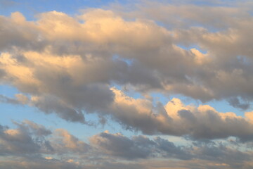Gray clouds in the blue sky.