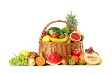 Many fresh ripe fruits in basket isolated on white
