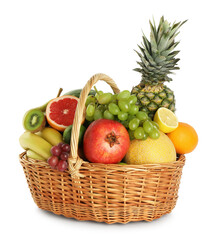 Many different fresh fruits in wicker basket isolated on white