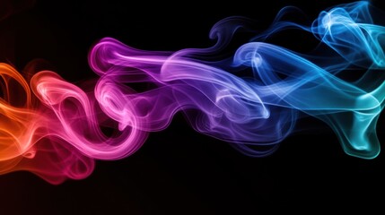 Obraz premium Colorful smoke swirls against a black background, creating a dynamic and artistic effect.