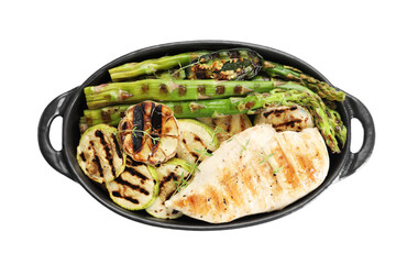 Delicious grilled vegetables and chicken breast in baking dish isolated on white, top view