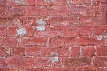 Brick wall from a church built in the 1760s, showing wear and repairs.