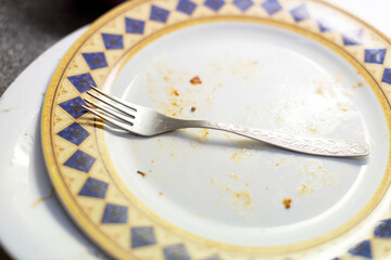 Dirty dishes in kitchen at ADHD person's home