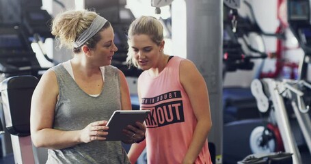 Women group, gym fitness and tablet for workout progress, lose weight results and teamwork or class goals. Personal trainer with digital technology for training advice, support and talking of health