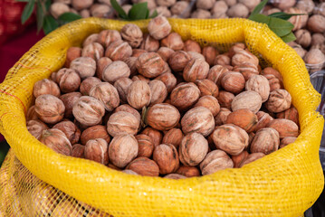 a bag of shelled walnuts, shelled walnuts in yellow sack