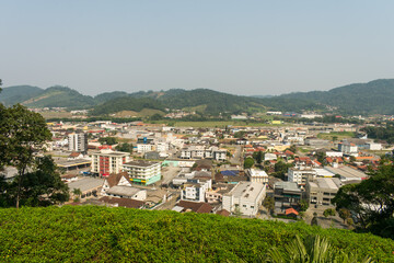 Obraz premium Guaramirim, Brazil - September 8th 2024: A view of Guaramirim from Morro da Santa Viewpoint - Santa Catarina, South of Brazil