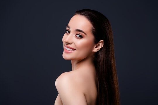 Photo of adorble cheerful lady naked shoulders make up isolated on dark grey color background