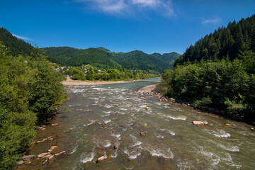 The confluence of the White and Black Cheremosh rivers in the Carpathians, Usetriky, Verkhovyna,...