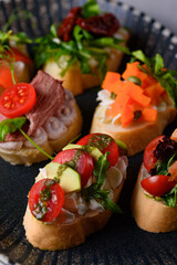 snack. bruschetta on fresh bread with a wide range of combinations