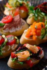 snack. bruschetta on fresh bread with a wide range of combinations