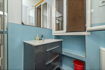 Water-efficient faucets and showers are used, and some modern bathrooms implement water reuse systems