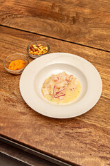 Peruvian ceviche is characterized by its leche de tigre