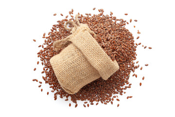 Close-up of organic Flaxseeds (Linum usitatissimum) in a jute bag on a heap of Flaxseeds, isolated...