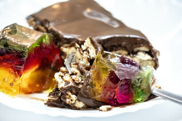 Classic chocolate pavé served with colored gelatin. perfect combination of flavors