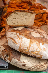 Freshly baked big sourdough traditional italian bread on olive wood fired oven