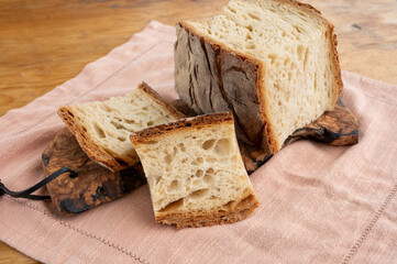 Freshly baked big sourdough traditional italian bread on olive wood fired oven