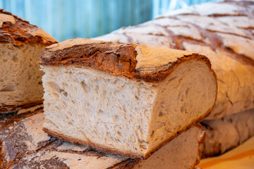 Freshly baked big sourdough traditional italian bread on olive wood fired oven