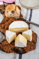 French soft Camembert cheese, original Camembert de Normandie made from raw cow milk