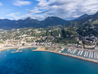 Aerial view on French Riviera, colorful Menton old city and marina on Mediterranean Sea near French-Italian border, travel destination, panoramic view from above